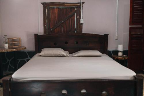 Postel nebo postele na pokoji v ubytování Camilas Beach House