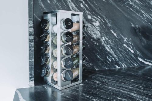 a case of wine bottles in a wall at Ocean View Luxury Living in Carlsbad