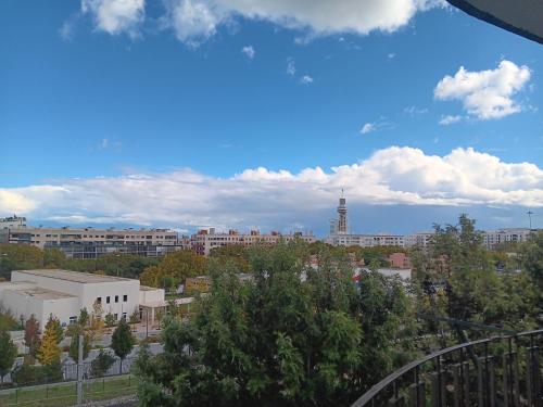 a view of a city with buildings in the background at Milena 4 in Lisbon