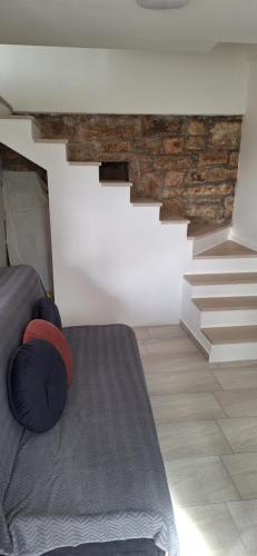 Ένα ή περισσότερα κρεβάτια σε δωμάτιο στο Studio apartman "Stara kuća"