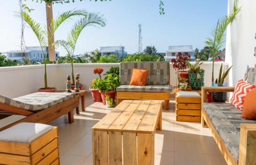 Posezení v ubytování Kejani Paradise - Tropical serviced Condo at The Soul, Paje