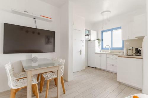 Η κουζίνα ή μικρή κουζίνα στο GW932 Gugel Waves Amazing Seaview Apartments