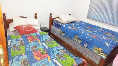 Postel nebo postele na pokoji v ubytování Espacio Reservado