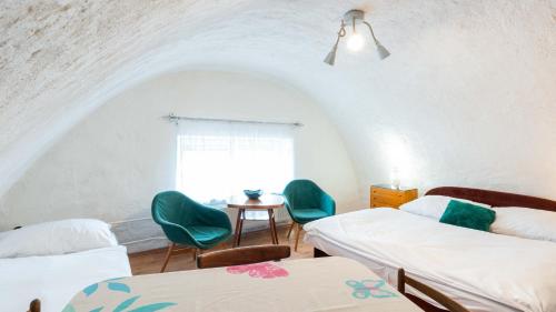 Postel nebo postele na pokoji v ubytování Holiday House Mária