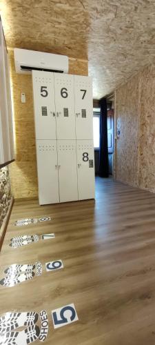 a room with a row of lockers on the floor at Donna Nega Guest House in Caminha