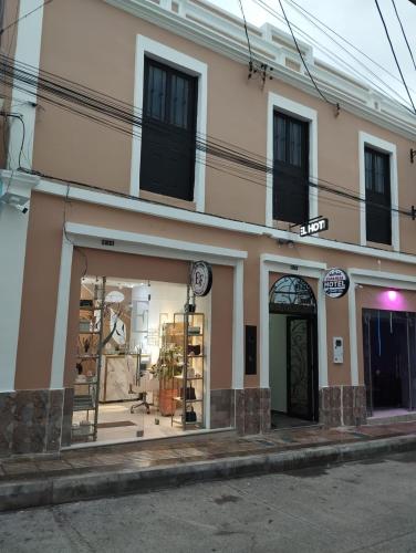 a store front of a building on a street at Hotel Casa Real Málaga Santander in Málaga
