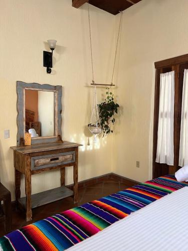 Кровать или кровати в номере Hotel Artesanal