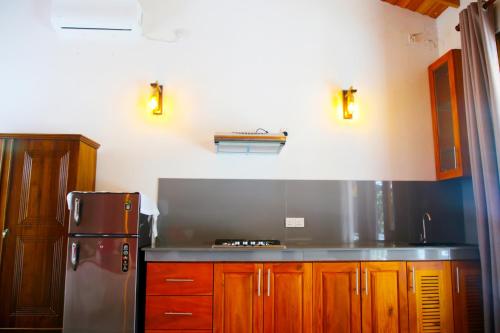 Kuchyň nebo kuchyňský kout v ubytování B & G Hotel