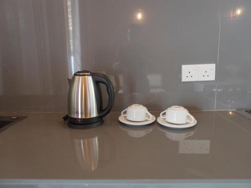Příslušenství pro přípravu čaje a kávy v ubytování B & G Hotel
