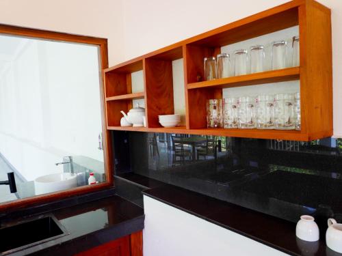 Kuchyň nebo kuchyňský kout v ubytování B & G Hotel