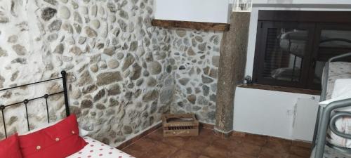 Postel nebo postele na pokoji v ubytování El respiro de Candeleda