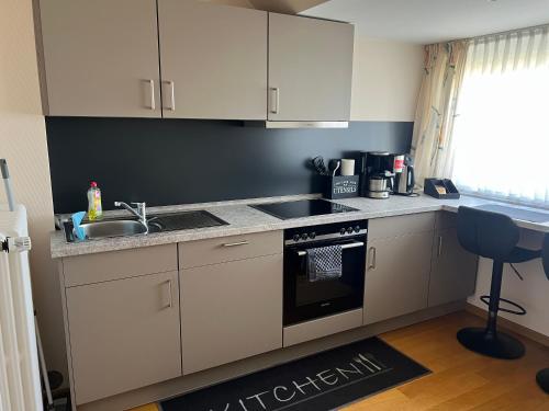 Kuchyň nebo kuchyňský kout v ubytování Dünenhaus 2 Schlafzimmer