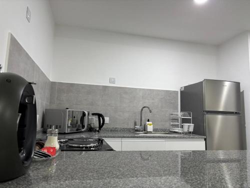 Η κουζίνα ή μικρή κουζίνα στο Tigre High View Luxury views