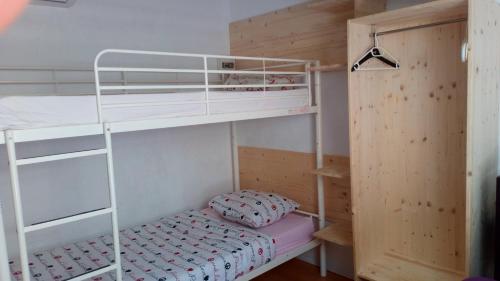a bunk bed in a room with a bunk bed gmaxwell gmaxwell gmaxwell gmaxwell at Crew Lighthouse in Antibes