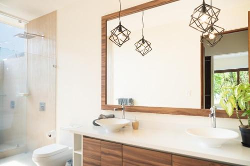 Ένα μπάνιο στο La Perla Cozy 3BR sleeps 10 Hacienda Pinilla