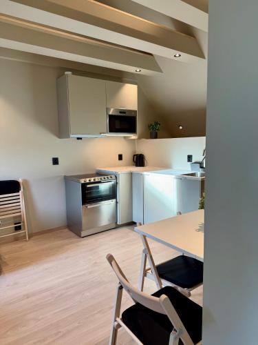 Η κουζίνα ή μικρή κουζίνα στο Divine Bergen Top Apartment