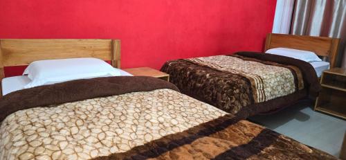 Postel nebo postele na pokoji v ubytování Myodi-Yasi Homestay Rake Ziro 5 mnts walk from Airport