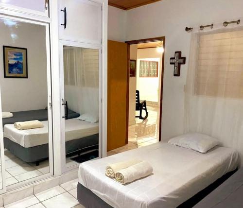 Postel nebo postele na pokoji v ubytování Casa Arcia