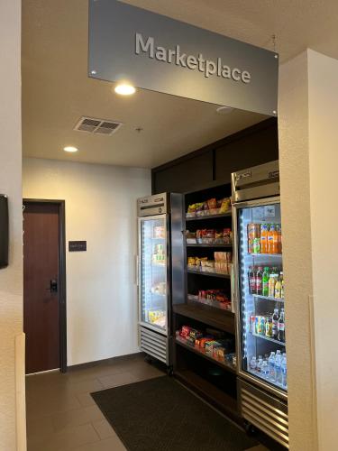 a store with a large refrigerator in a store at Comfort Suites Denver International Airport in Denver