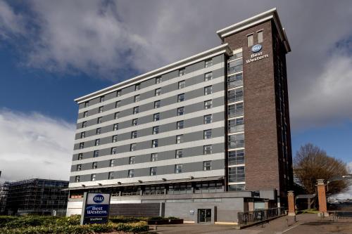 a large building with a clock on the side of it at Best Western Sheffield City Hotel in Sheffield