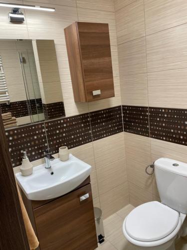 Kúpeľňa v ubytovaní Apartament Maja Zielone Tarasy Kołobrzeg