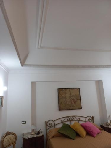 Un ou plusieurs lits dans un hébergement de l'établissement Al Palazzo Del Principe al Massimo