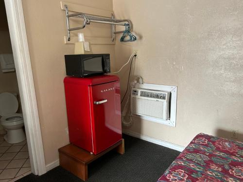 Kuchyň nebo kuchyňský kout v ubytování Sunset Motel