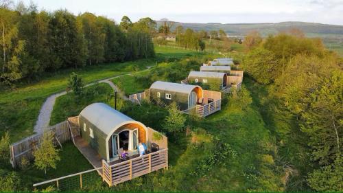 an aerial view of a group of tents in a field at Grange Beck Farm Glamping in Kildwick