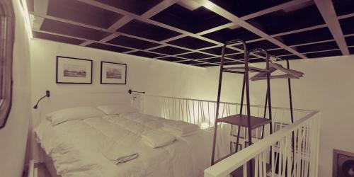 Кровать или кровати в номере San Pietro Classy Old Town Apartment