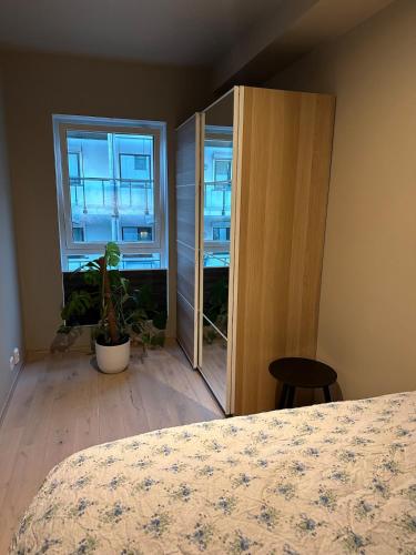 Ένα ή περισσότερα κρεβάτια σε δωμάτιο στο Apartment in Kristiansand