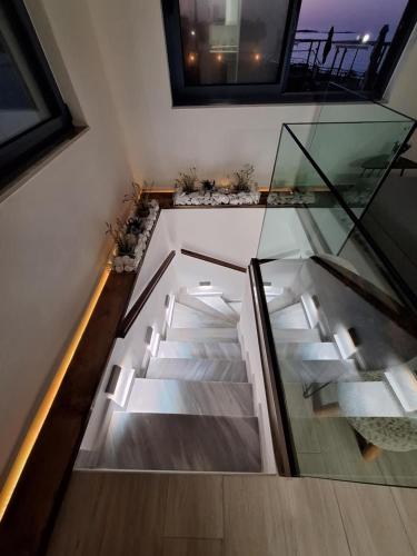 Blue Balcony - Boutique Beachfront Suite with Private Parking Spot near Chania Old Harbor