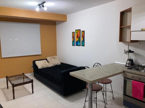 Χώρος καθιστικού στο Apartamento en Nueva Barcelona, cerca de playas y comercios