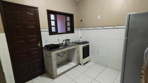 Η κουζίνα ή μικρή κουζίνα στο Casa com Garagem, 3 Quartos e Churrasqueira