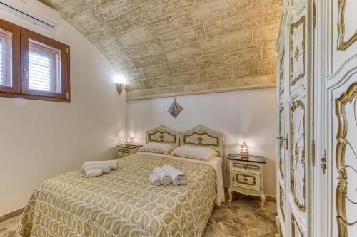 Postel nebo postele na pokoji v ubytování la liama del sole