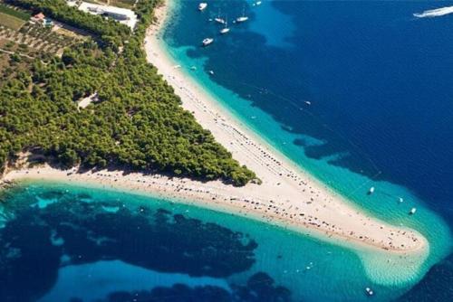 an aerial view of a beach and the ocean at Apartment Zdravko in Bol
