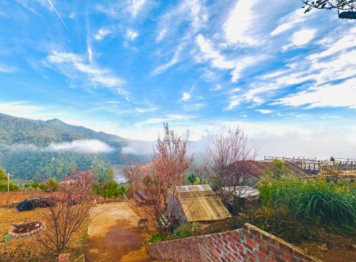 a view of a mountain with a blue sky and clouds at TopView Măng Đen in Kon Von Kla
