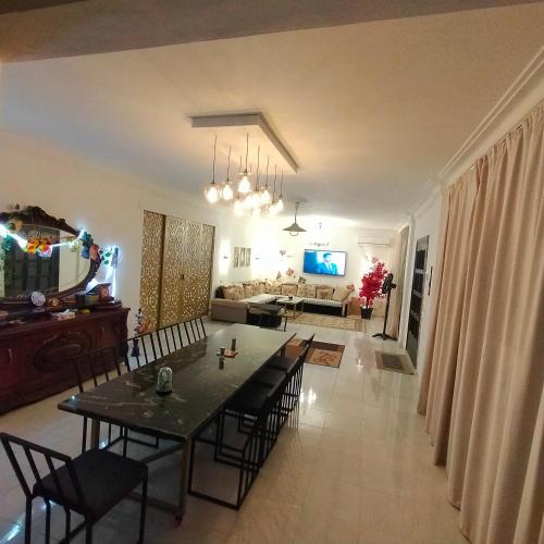 Gallery image of Two pools four bedrooms private villa in Qaryat Shākūsh