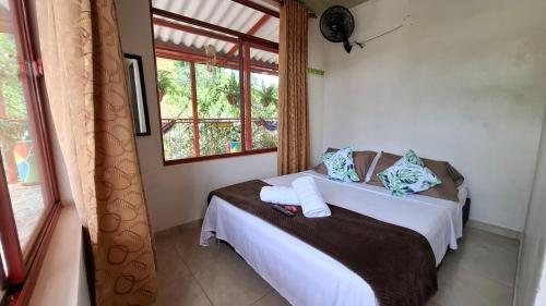 Postel nebo postele na pokoji v ubytování New Paradise Nueva Sede - La Vega Cundinamarca