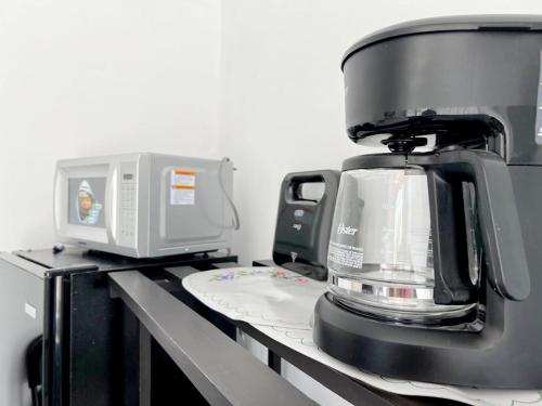 a coffee maker sitting on top of a counter at Habitacion Acojedora in Tehuacán