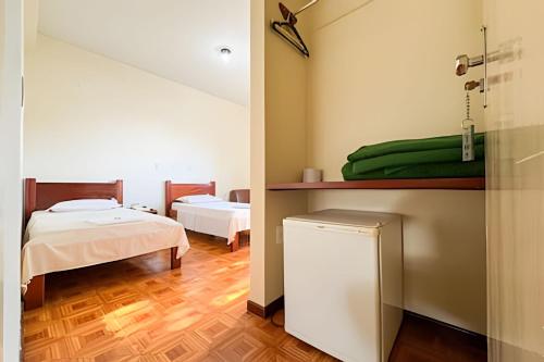 Una cama o camas en una habitación de LN Flats & Suites