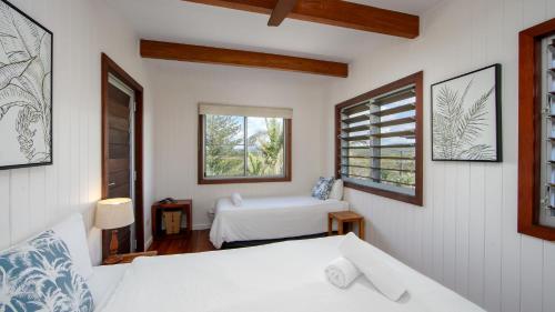Ένα ή περισσότερα κρεβάτια σε δωμάτιο στο Pacifica House