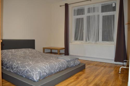 Ένα ή περισσότερα κρεβάτια σε δωμάτιο στο Nice One Bedroom Flat