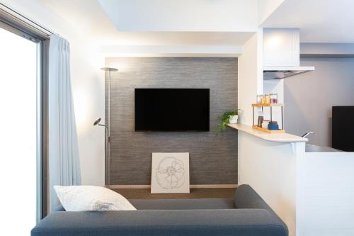 Televiisor ja/või meelelahutuskeskus majutusasutuses R Hotel HAKATA 美野島