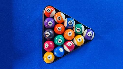 a group of billiard balls in a black container at Grand Howard Hotel Bangkok in Bangkok