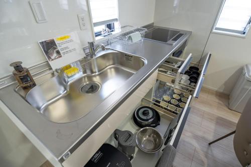 Η κουζίνα ή μικρή κουζίνα στο Fuji Holiday C