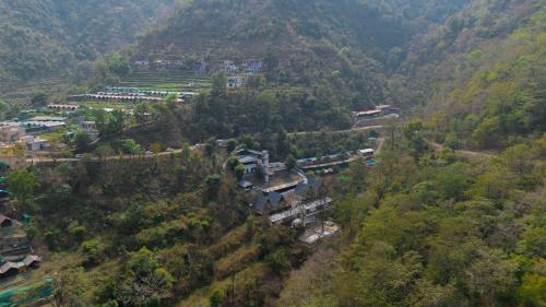 an aerial view of a village in a mountain at Perfectstayz The Jungle Resort, Shivpuri in Shivpuri