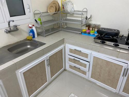Kuchyň nebo kuchyňský kout v ubytování Luban Camping House