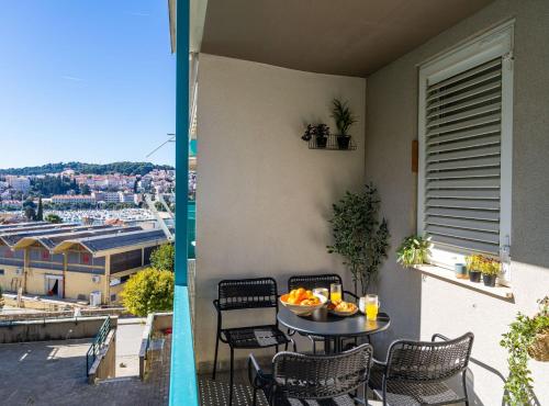 Modern City Escape with Balcony - Near the Ferry Port