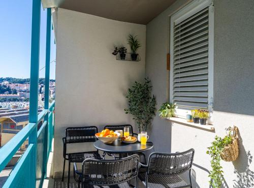 Modern City Escape with Balcony - Near the Ferry Port