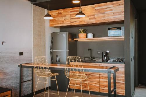 Η κουζίνα ή μικρή κουζίνα στο Hotel 3450 Living Lofts
